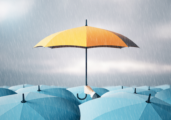 UmbrellaAboveCrowd_AdobeStock_498683522_700x400